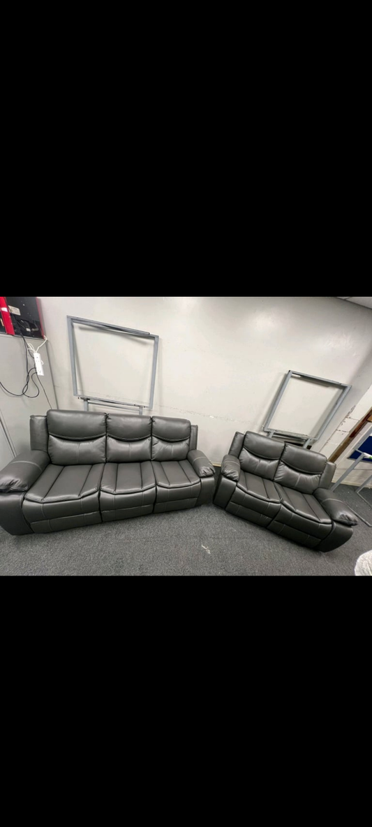 3&2 dark grey leather sofa all recliner